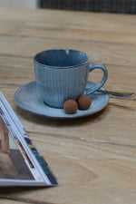 Blue Broste tea cup with saucer with geometric design 