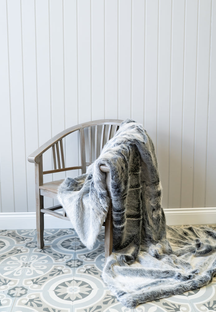 
                
                    Load image into Gallery viewer, Faux fur throw in grey over Wooden dining chair
                
            